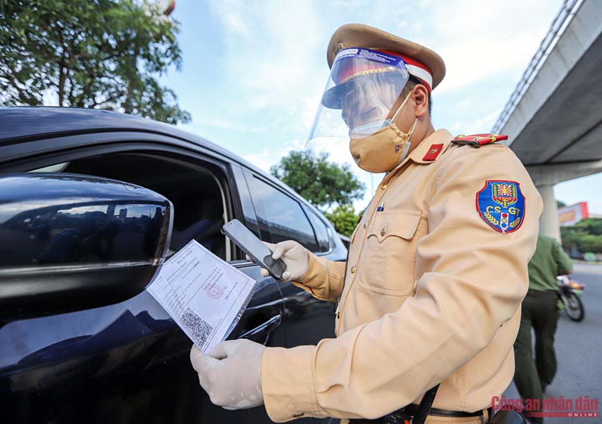 policeman checking travel pass