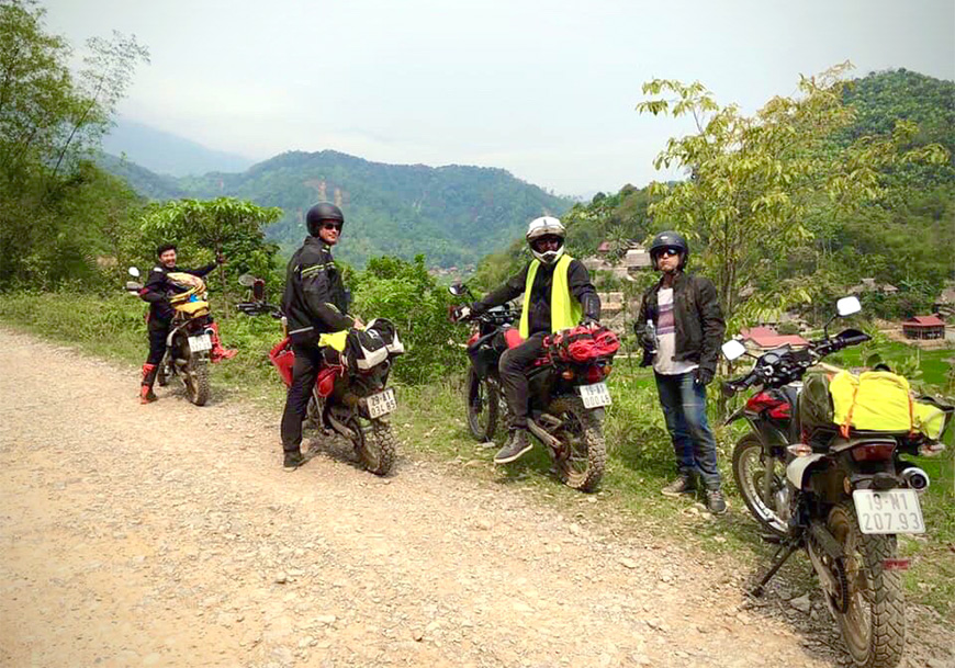 Group of tourists on Motorbike tour - Vietnam Northern Loop