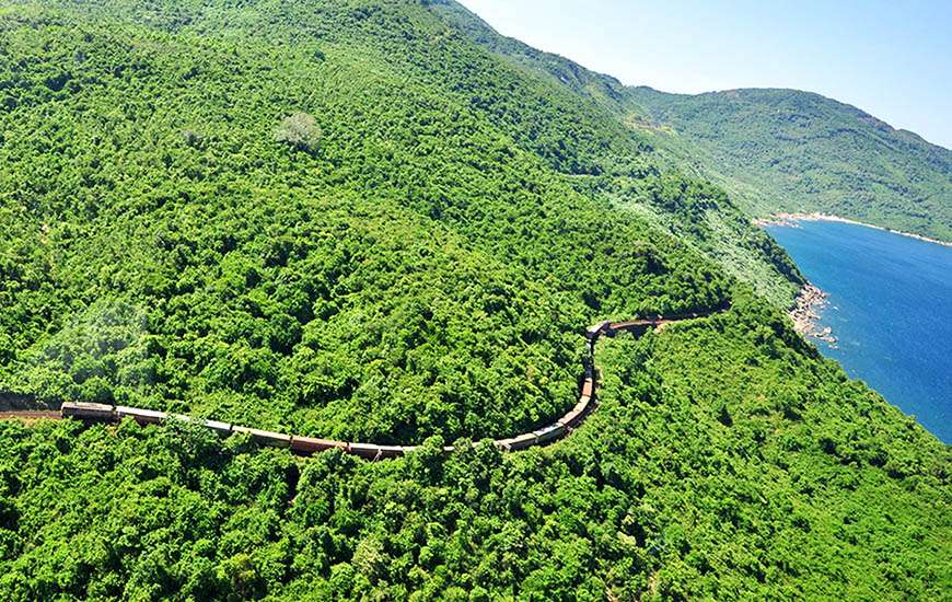 A train moves past Hai Van pass