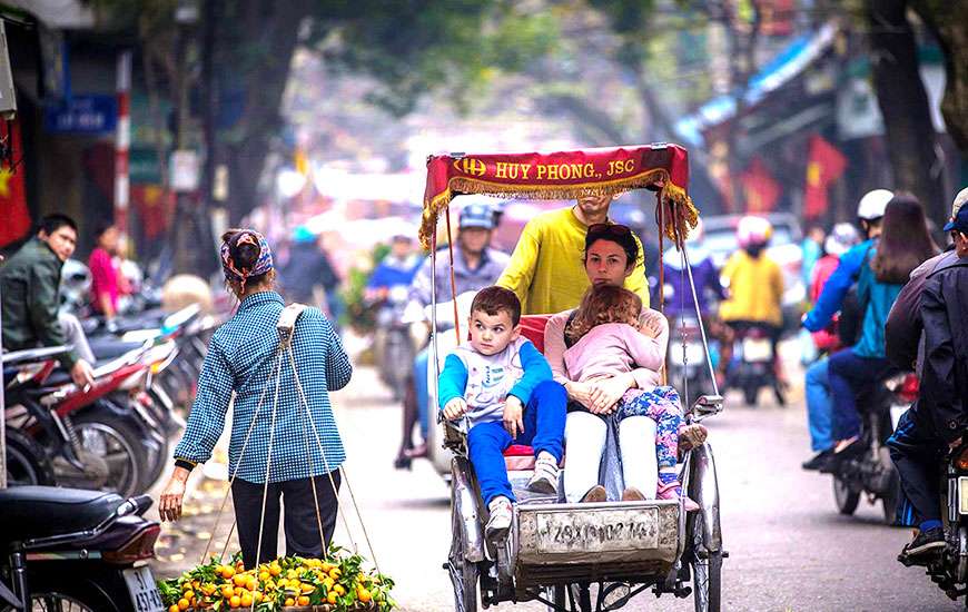 Cyclo aound old quarter of Hanoi